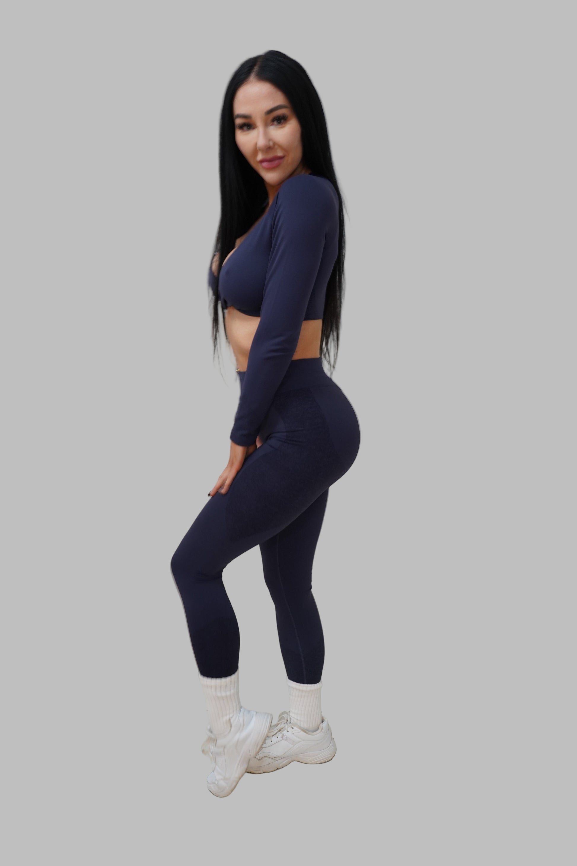 Person wearing a navy blue outfit.
